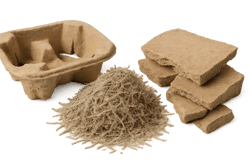 photographic Photorealistic image of raw ecofriendly packaging materials including moulded paper pulp shredded recycled paper fibres and compressed ca